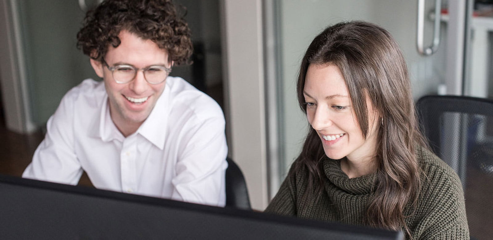 cahill cpa north vancouver accountants working at desk